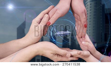 Mens, Womens And Childrens Hands Show A Hologram 3d Cruise Liner