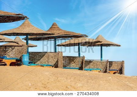 Deck Chairs And Straw Beach Umbrellas, Red Sea Beach, Near Marsa Alam, Egypt, Africa
