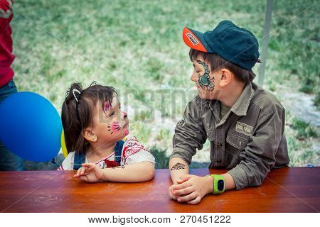 Zaporozhia/ukraine- June 2, 2018: Children - Cute And Funny Boy And Girl With Face Paintings - Cat M