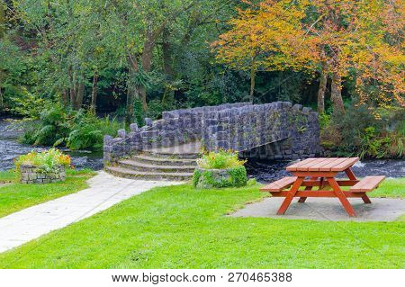 Stone Bridge Over Owenriff River And Picnic Table