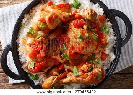 Haitian Chicken Recipe Is A One Pot Of Chicken, Tomatoes, Wine, Spices, And Rice Close-up. Horizonta
