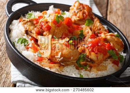 Haitian Stewed Chicken (poulet Creole) With Rice Closeup. Horiontal