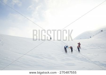 Skitouring With Amazing View Of Mountains In Beautiful Winter Powder Snow