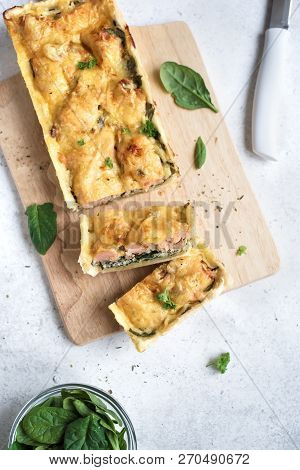 Salmon Spinach Pie (quiche) With Cheese On White Background. Homemade Salmon Tart For Healthy Lunch,