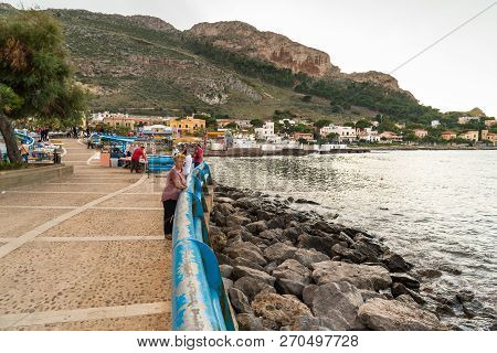 Sferracavallo, Sicily, Italy - October 1, 2018: Waterfront Promenade With People Enjoying The Aftern