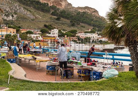 Sferracavallo, Sicily, Italy - October 1, 2018: Waterfront Promenade With People Enjoying The Aftern