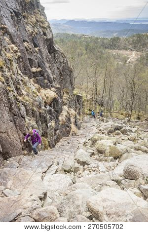 Preikestolhytta , Norway - May 13, 2017: Tourists On Trail To Preikestolen On May 13, 2017 In Preike