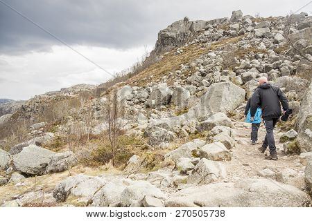 Preikestolhytta , Norway - May 13, 2017: Tourists On Trail To Preikestolen On May 13, 2017 In Preike