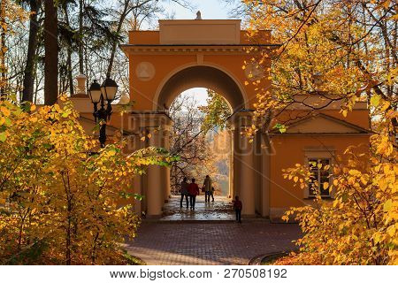 Moscow, Russia - October 17, 2018: Tourists Walking Under Arc Of Pavilion Milovida In Tsaritsyno Par