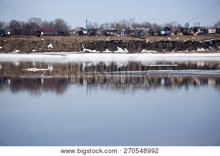Big Chunk Of Ice In The River Dniepr Dnipro On A Winter Day, Near A Coast