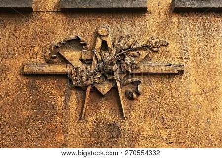 Grunge Freemasonry Emblem On A Dramatic Background - Masonic Triangle And Compass, Closeup Of Old Ar