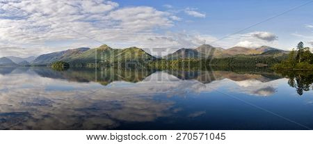 Derwent Reflections With View Of The Cumbrian Mountains In The Lake District, Cumbria, England
