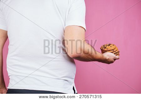 Overweight, Sugar Addiction, Imbalanced Ration, Eating Fast Food. Obese Glutton Man With Stack Of Ch