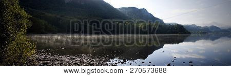 Derwent Water Reflections With Mist, Lake District, Cumbria, England