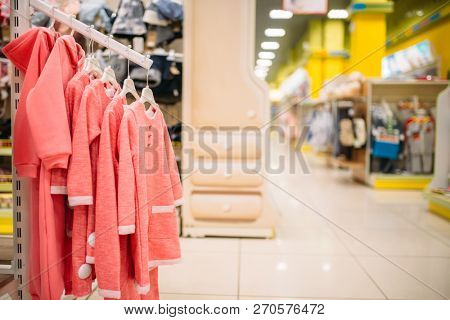 Store for newborns, showcase in cloth department