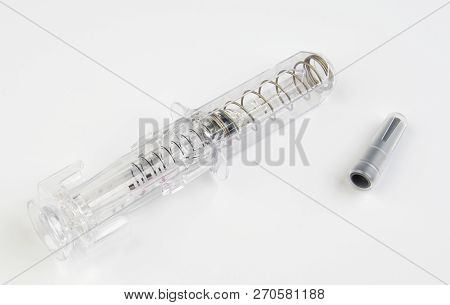 Transparent Syringe With Eralfon On A White Background.