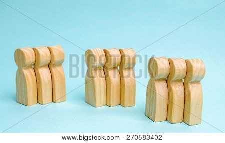 Groups Of Wooden People. The Concept Of Market Segmentation. Marketing Segmentation, Target Audience