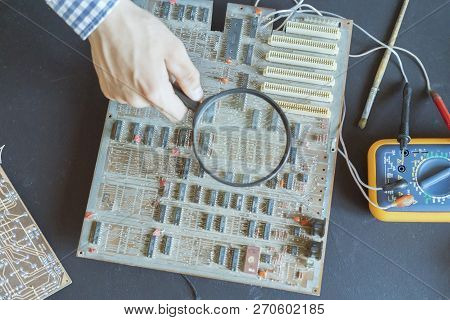 Micro Or Nano Electronic Board Reapir Concept, Hand Hold Magnifying Glass