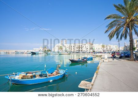Molfetta, Apulia, Italy - June 3, 2017 - Traditional Fishing Boats At The Harbor Promenade Of Molfet