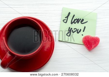 Cup Of Coffee, A Candy In The Shape Of A Heart And A Note I Love You. St. Valentine's Day