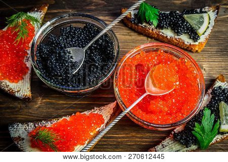Preparation Of Sandwiches With Red And Black Caviar.