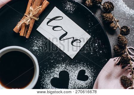 Valentines Day With Cup Of Coffee, Bumps,skarf, Cinnamon And Heart On Gray Table From Above In Flat 