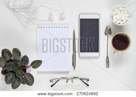 Coffee Break In The Workplace With Phone And Acsessories