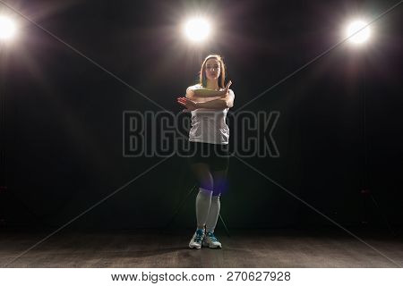 Hip-hop, Jazz-funk, Tecktonik, Waacking, Trance And Street Dances Concept - Young Woman Dancing Jazz