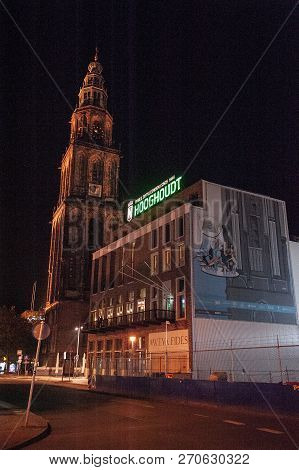 Groningen, October 10 2018. Night Shot Of The Vindicat Fraternaty Building, With The Martini Tower I