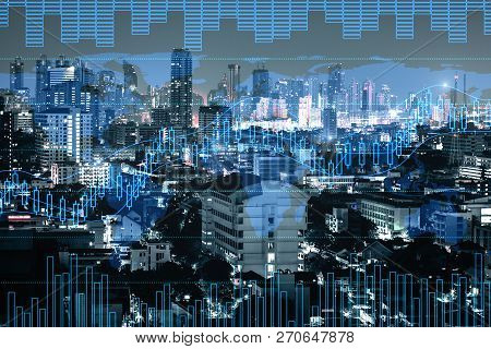 Night City Background With Digital Forex Chart. Trade And Finance Concept. Double Exposure