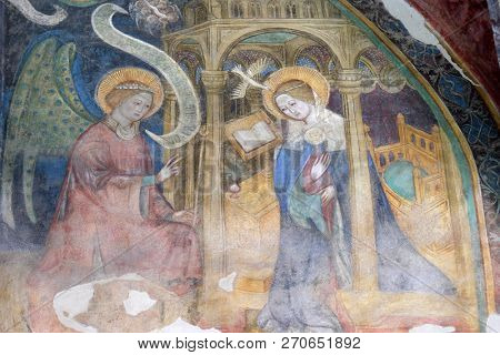 BRESSANONE, ITALY - JULY 14, 2018: Annunciation to the Virgin Mary, fresco in the cloister, Cathedral of Santa Maria Assunta i San Cassiano in Bressanone, Italy