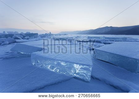 Turquoise Ice Floe. Winter Landscape Of Baikal Lake