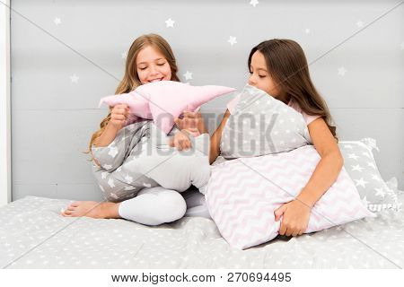 Girls Happy Friends With Cute Pillows. Pillow Fight Pajama Party. Sleepover Time For Pillow Fight. D