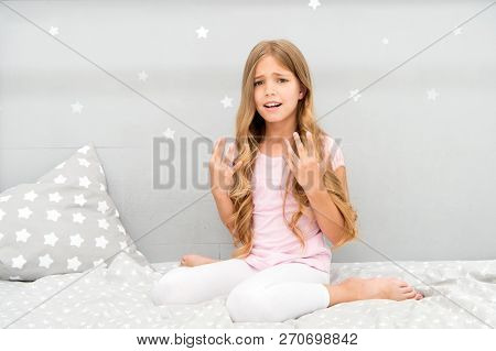 Girl Disappointed With Long Curly Hair Grey Background. Things You Shouldnt Do At Night If You Want 