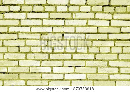 Old Grungy Brick Wall Surface In Yellow Tone. Abstract Architectural Background And Texture For Desi