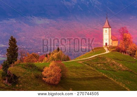 Autumn Red Sunset Panorama With Saints Primus And Felician Church On Top Of Hill In Jamnik, Slovenia