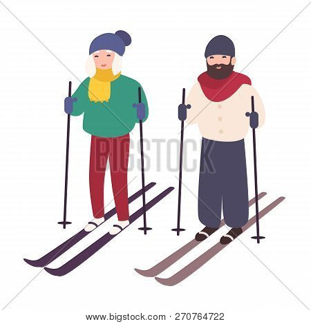 Young Couple Skiing Together. Happy Smiling Man And Woman On Skis. Winter Sports And Recreational Ac