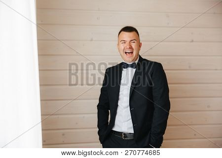 Happy Young Man Smile. He Stand Near The Windor And Have Fun