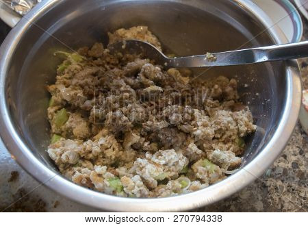 The Ingredients Of A Batch Of Sasuage Stuffing Is Being Mixed To Stuff The Turkey For The Thanksgivi