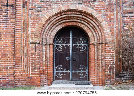 Entrance Door To The Historic Ratzeburg Cathedral In Typical Brick Architecture In North Germany