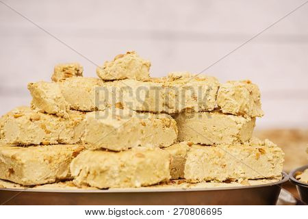 Halvah Sweet Traditional Food Dessert Made Of Nuts. Delicious Food, Tasty Healthy Snacks Concept.