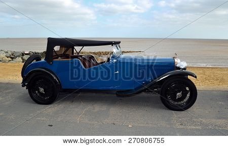Felixstowe, Suffolk, England -  May 07, 2017: Classic Blue Alvis Motor Car Parked On Seafront Promen