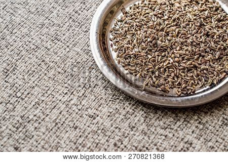 Dried Anise Seed Or Aniseed On Silver Plate. (anason). Organic Concept.