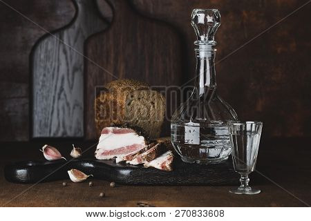 Still Life With Vodka, Bread And Bacon In Russian Style
