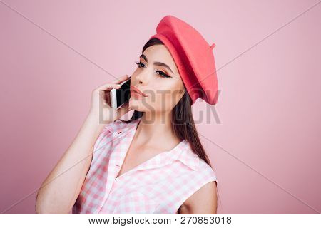 French Girl With Phone. Parisian Lady. Pinup Girl With Fashion Hair. Pin Up Woman With Trendy Makeup