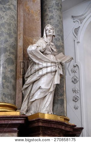 WEINGARTEN, GERMANY - JULY 12, 2018: Saint Anne statue on the Crucifixion altar in the Basilica of St. Martin and Oswald in Weingarten, Germany