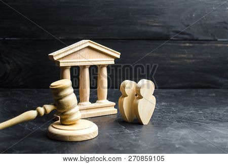 People Standing Near The House Of Government And Judge's Gavel. Concept Of The Judicial System And T