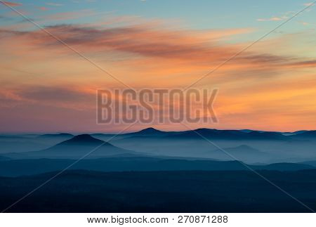 Dramatic Sunrise Over Beautiful Mountain Peaks. Czech National Park. Colorful Sky With Clouds And Su