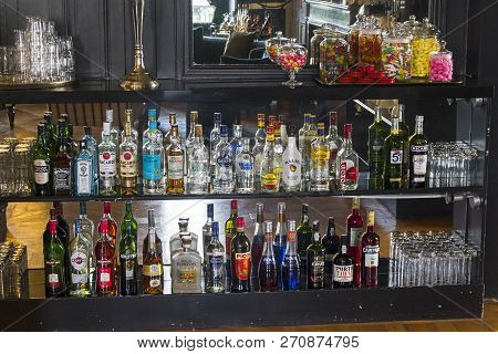 Mello, France - August 27, 2018: A Large Variety Of Liquor In The Bar.