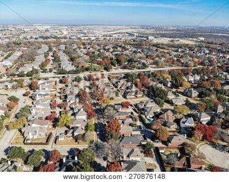 Aerial View Residential Neighborhood With Highway Stack Interchange In Fall Season In Texas